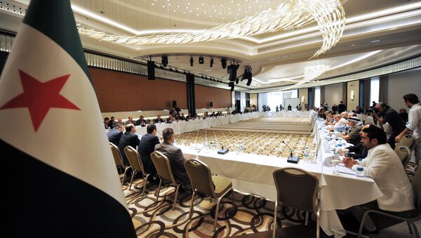 Members of Syrian National coalition (SNC) attend a meeting of the National Coalition of Syrian Revolution and Opposition forces on September 13, 2013, in Istanbul - Sputnik International