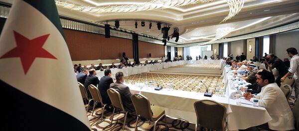 Members of Syrian National coalition (SNC) attend a meeting of the National Coalition of Syrian Revolution and Opposition forces on September 13, 2013, in Istanbul - Sputnik International