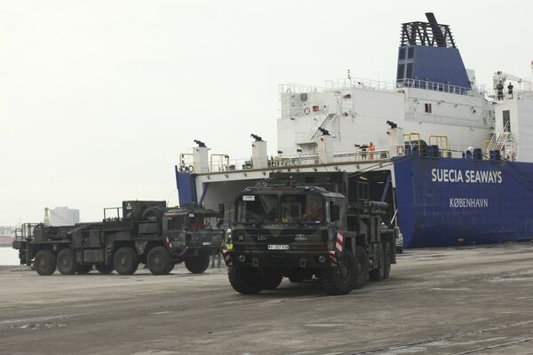 German military trucks carrying NATO's Patriot Missile Defense System to protect Turkey in case neighboring Syria launches an attack leave the port after the parts of system were unloaded in the Mediterranean city of Iskenderun, Turkey, Monday, Jan. 21, 2013 German military trucks carrying NATO's Patriot Missile Defense System to protect Turkey in case neighboring Syria launches an attack leave the port after the parts of system were unloaded in the Mediterranean city of Iskenderun, Turkey, Monday, Jan. 21, 2013 - Sputnik International