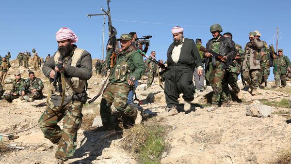 Members of the Kurdish peshmerga forces gather in the town of Sinjar, Iraq. File photo - Sputnik International