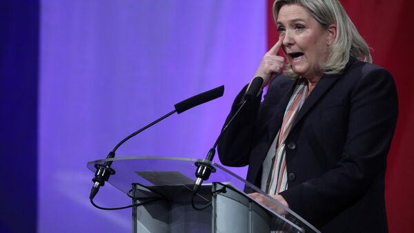 French far-right party leader Marine Le Pen gestures during a meeting in Lille, northern France, Monday, Nov. 30, 2015. - Sputnik International