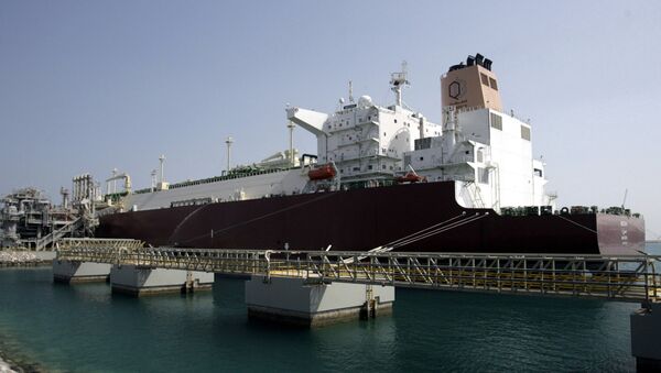 LNG carrier 'Mozah' docked at Ras Laffan port near Doha on Saturday, April 4, 2009 - Sputnik International