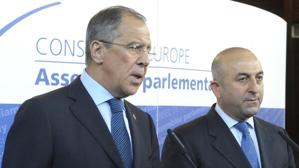 File Photo: Russian Foreign Minister Sergei Lavrov, left, and  Turkish Foreign Minister Mevlut Cavusoglu - Sputnik International