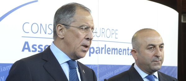 Russian Foreign Minister Sergei Lavrov, left, and  Turkish Foreign Minister Mevlut Cavusoglu - Sputnik International