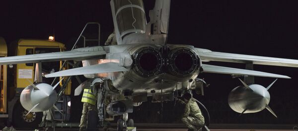 British crew work at a warplane at the RAF Akrotiri, a British air base near costal city of Limassol, Cyprus, early Thursday, Dec. 3, 2015 after an airstrike British crew work at a warplane at the RAF Akrotiri, a British air base near costal city of Limassol, Cyprus, early Thursday, Dec. 3, 2015 after an airstrike - Sputnik International