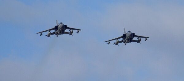 Two British Tornados warplanes fly over the RAF Akrotiri, a British air base near costal city of Limassol, Cyprus, Thursday, Dec. 3, 2015, as they arrive from an airstrike against Islamic State group targets in Syria - Sputnik International