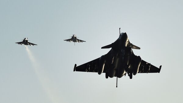 File Photo: French Rafale fighter aircrafts come back aboard the French Charles-de-Gaulle aircraft carrier, after flights on November 23, 2015 at eastern Mediterranean sea, as part of operation Chammal in Syria and Irak against the Daesh group - Sputnik International