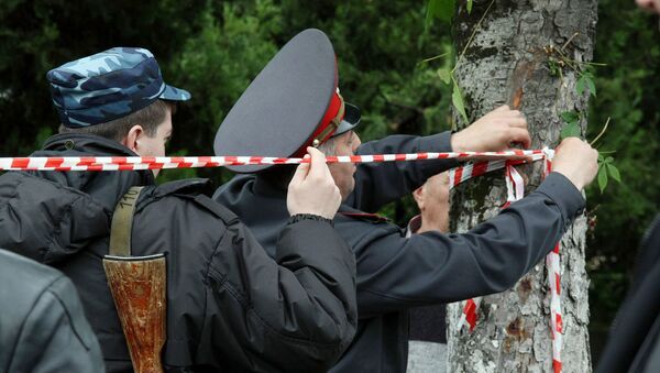 Law enforcement officers conducting a raid to seize a group of militants in Nalchik - Sputnik International