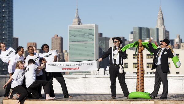 An ActionAid protest occurs in front of the United Nations HQ. - Sputnik International