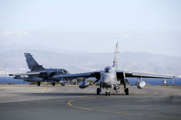 Two British Tornados taxi on the runway, after returning from a mission, at RAF Akrotiri in southern Cyprus December 3, 2015 Two British Tornados taxi on the runway, after returning from a mission, at RAF Akrotiri in southern Cyprus December 3, 2015 - Sputnik International