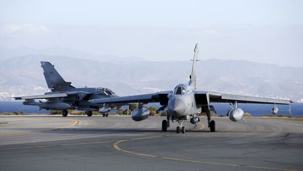 Two British Tornados taxi on the runway, after returning from a mission, at RAF Akrotiri in southern Cyprus December 3, 2015 - Sputnik International