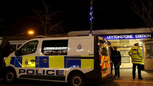 Police officers investigate a crime scene at Leytonstone underground station in east London, Britain - Sputnik International