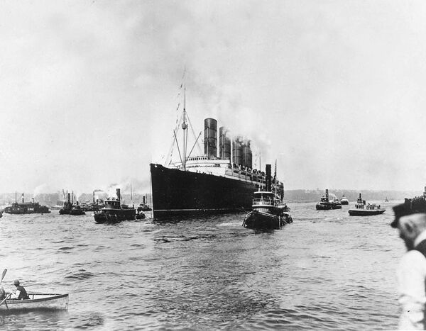 This is a general view of the British cargo and passenger ship Lusitania as it sets out for England on its last voyage from New York City on May 1, 1915. The British ocean liner was torpedoed by a German U-boat off the southern coast of Ireland on May 7, 1915 and sank in 18 minutes, killing 1,150 people. - Sputnik International