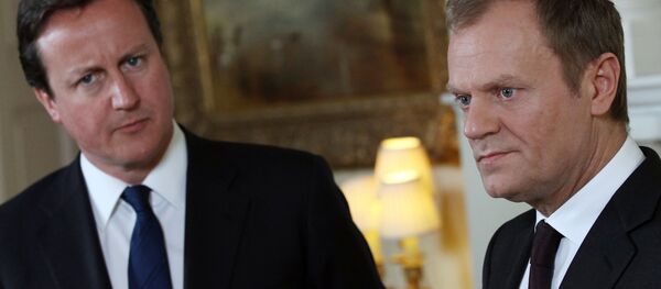 Britain's Prime Minister David Cameron, left, listens to European Council President Donald Tusk. Britain's Prime Minister David Cameron, left, listens to European Council President Donald Tusk. - Sputnik International