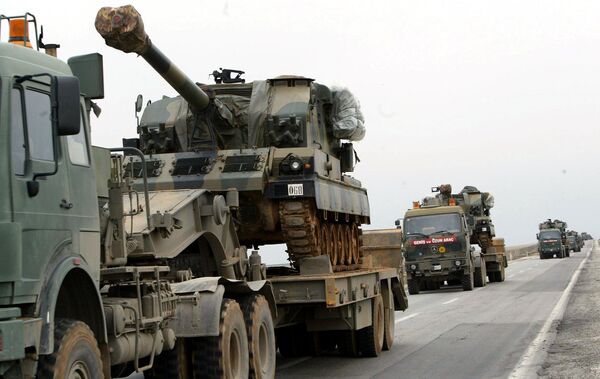 A large convoy of Turkish military including tanks and ambulances rolls from the southeastern part of Turkey toward the Iraqi border (File) A large convoy of Turkish military including tanks and ambulances rolls from the southeastern part of Turkey toward the Iraqi border (File) - Sputnik International