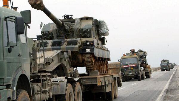 A large convoy of Turkish military including tanks and ambulances rolls  from the southeastern part of Turkey toward the Iraqi border. file photo - Sputnik International