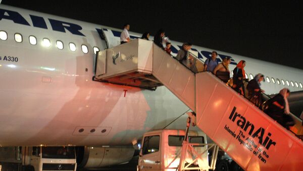 Passengers of Paris-Tehran flight of Air France take the stairs down to Tehran's Mehrabad airport (File) - Sputnik International