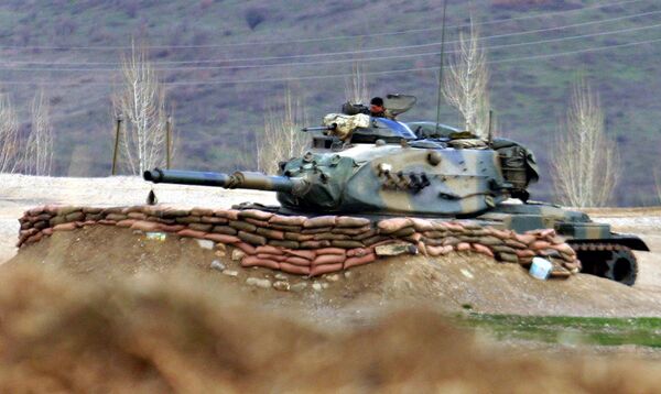 Turkish Army tank stands ready near the village of Bamarni in northern Iraq, 30km beyond the Turkey-Iraq border Turkish Army tank stands ready near the village of Bamarni in northern Iraq, 30km beyond the Turkey-Iraq border - Sputnik International