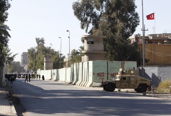 Iraqi security forces stand guard with their military vehicle outside the Turkish embassy in Baghdad December 8 2015 Iraqi security forces stand guard with their military vehicle outside the Turkish embassy in Baghdad December 8 2015 - Sputnik International