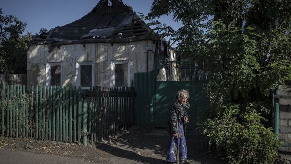 Residents of Staromikhailovka village in Donetsk region - Sputnik International
