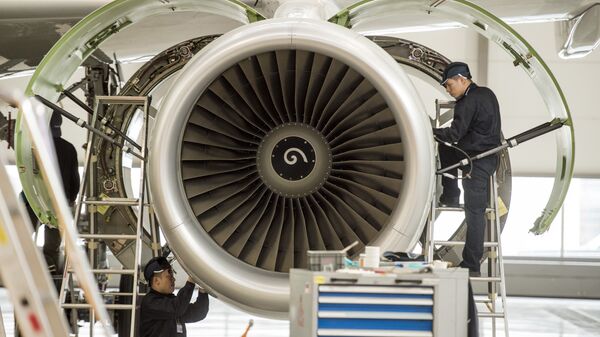 Chinese labourers work at the distribution chain for jet engines at the Airbus factory in Tianjin (File) - Sputnik International