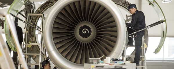 Chinese labourers work at the distribution chain for jet engines at the Airbus factory in Tianjin (File) Chinese labourers work at the distribution chain for jet engines at the Airbus factory in Tianjin (File) - Sputnik International