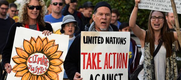 Actor and activist A. Martinez surrounded by Environmental activists and supporters during a rally calling for action on climate change in Los Angeles, California on November 29, 2015, a day before the start of the COP21 conference in Paris Actor and activist A. Martinez surrounded by Environmental activists and supporters during a rally calling for action on climate change in Los Angeles, California on November 29, 2015, a day before the start of the COP21 conference in Paris - Sputnik International