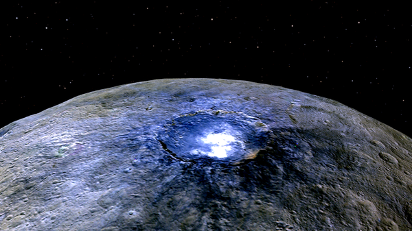 This representation of Ceres' Occator Crater in false colors shows differences in the surface composition. - Sputnik International