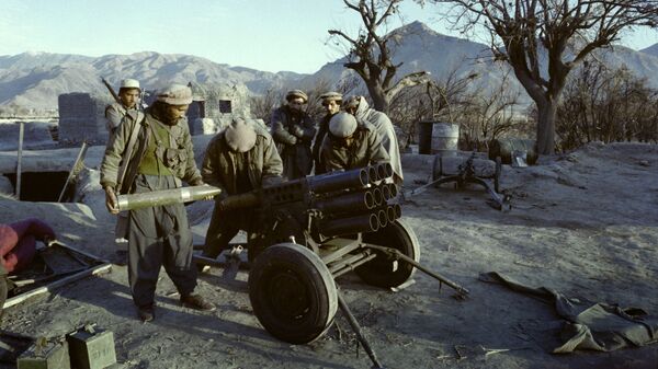 Afghan mujahideen prepare a rocket attack on the government troops in Shaga, Eastern Nangarhar province, on January 15, 1989 during the Afghan Civil War opposing the Islamic Unity of Afghanistan Mujahideen and the Democratic Republic of Afghanistan (DRA) supported by Soviet Union - Sputnik International