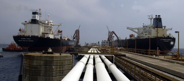 Two oil tankers, the Turkish Ottoman Dignity, right, and the Spanish Sandra Tapias, sit at Ceyhan oil terminal in this June 22, 2003 photo Two oil tankers, the Turkish Ottoman Dignity, right, and the Spanish Sandra Tapias, sit at Ceyhan oil terminal in this June 22, 2003 photo - Sputnik International