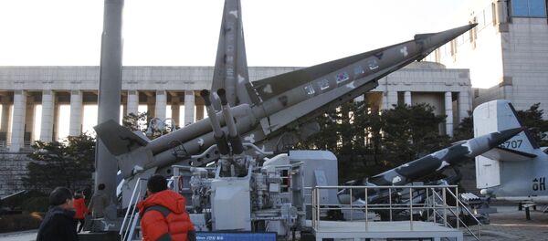 Visitors walk watch models of North Korea's Scud-B missile, left, and other South Korean missiles on display at Korea War Memorial Museum in Seoul, South Korea. Friday, Jan. 25, 2013 - Sputnik International