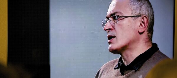 Mikhail Khodorkovsky, once Russia's richest man, speaks during a webcast conference in London, and is seen on a TV screen in Open Russia movement office in Moscow, Russia, on Wednesday, Dec. 9, 2015 Mikhail Khodorkovsky, once Russia's richest man, speaks during a webcast conference in London, and is seen on a TV screen in Open Russia movement office in Moscow, Russia, on Wednesday, Dec. 9, 2015 - Sputnik International