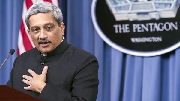 Indian Defense Minister Manohar Parrikar gestures while answering a reporters question during a joint news conference with Defense Secretary Ash Carter, Thursday, Dec. 10, 2015, at the Pentagon - Sputnik International