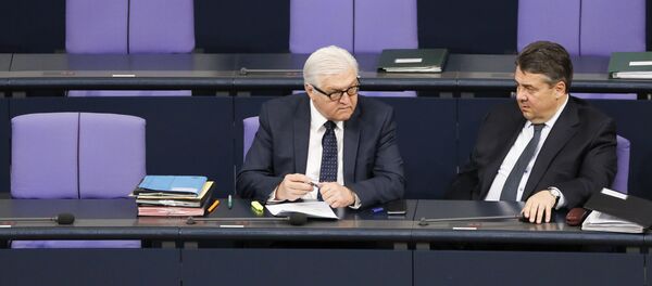 German Vice Chancellor and Economy Minister Sigmar Gabriel, right, talks with Foreign Minister Frank-Walter Steinmeier prior to the session of the parliament Bundestag in Berlin, Germany, Thursday, March 26, 2015 German Vice Chancellor and Economy Minister Sigmar Gabriel, right, talks with Foreign Minister Frank-Walter Steinmeier prior to the session of the parliament Bundestag in Berlin, Germany, Thursday, March 26, 2015 - Sputnik International