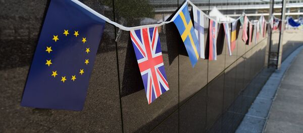 An European flag and a British flag stand next to each others outside the European Commission building, in Brussels, on May 8 2015. - Sputnik International