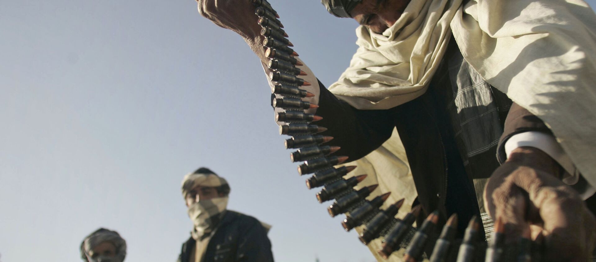 FILE - In this Dec. 28, 2011 file photo, a former Taliban fighter places a range of bullets before surrendering it to Afghan authorities, as part of a peace-reconciliation program in Herat, west of Kabul, Afghanistan - Sputnik International, 1920, 11.07.2021