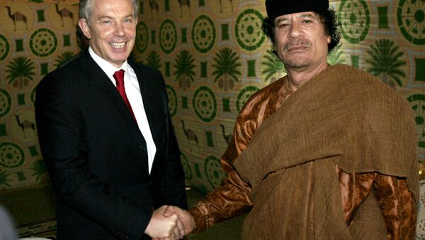 In this Tuesday May 29, 2007 file photo Britain's Prime Minister Tony Blair, left, meets Libyan leader Moammar Gadhafi, at his desert base outside Sirte south of Tripoli. - Sputnik International
