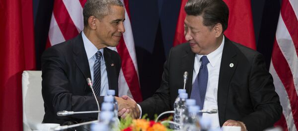 U.S. President Barack Obama, left, shakes hands with Chinese President Xi Jinping during their meeting held on the sidelines of the COP21, United Nations Climate Change Conference, in Le Bourget, outside Paris, Monday, Nov. 30, 2015 U.S. President Barack Obama, left, shakes hands with Chinese President Xi Jinping during their meeting held on the sidelines of the COP21, United Nations Climate Change Conference, in Le Bourget, outside Paris, Monday, Nov. 30, 2015 - Sputnik International