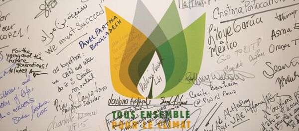 Messages are written on a wall during the World Climate Change Conference 2015 (COP21) at Le Bourget, near Paris, France, December 9, 2015 - Sputnik International