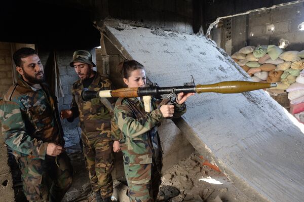 Soldiers of the Syrian Arab Army in Darayya, a Damascus suburb Soldiers of the Syrian Arab Army in Darayya, a Damascus suburb - Sputnik International