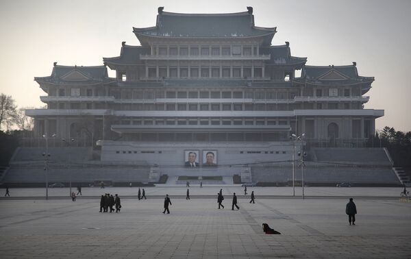 North Koreans walk along the Kim Il Sung Square as they commute at the end of their work day, Monday, Nov. 30, 2015, in Pyongyang, North Korea - Sputnik International
