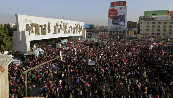 Protesters shout slogans during a demonstration against the Turkish military deployment in Iraq, at Tahrir Square in central Baghdad, Iraq, December 12, 2015 - Sputnik International