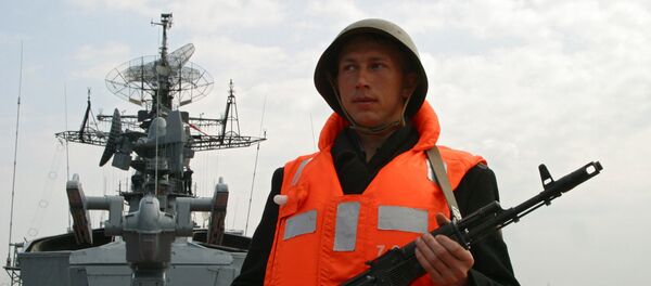 A serviceman of the Smetlivy anti-submarine ship of Russia's Black Sea Fleet A serviceman of the Smetlivy anti-submarine ship of Russia's Black Sea Fleet - Sputnik International