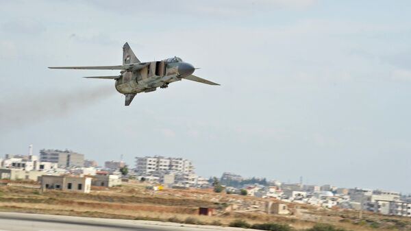 A MiG-23 aircraft of the Syrian Air Force lands at the Hama airbase near the city of Hama, Syria's Hama Province - Sputnik International