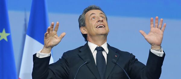 French Former President Nicolas Sarkozy reacts during the meeting of Conservative Republicans at the launch of the campaign for regional elections in Nogent-sur-Marne, outside Paris, Sunday, Sept. - Sputnik International
