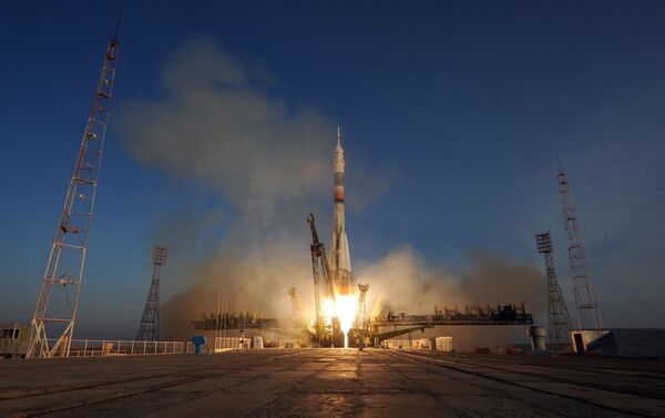 A Soyuz-FG launch vehicle with the Soyuz TMA-19M manned spacecraft lifts off from the Baikonur Space Center - Sputnik International