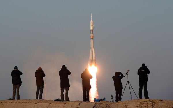 The launch of a Soyuz-FG rocket with the Soyuz TMA-19M manned spacecraft from the Baikonur Space Center - Sputnik International