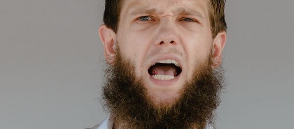 Islamist preacher Sven Lau aka Abu Adam talks during a rally on July 19, 2014 in Hamburg, northern Germany. - Sputnik International