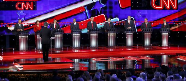 Republican U.S. presidential candidates (L-R) Governor John Kasich, former HP CEO Carly Fiorina, Senator Marco Rubio, Dr. Ben Carson, businessman Donald Trump, Senator Ted Cruz, former Governor Jeb Bush, Governor Chris Christie and Senator Rand Paul participate in the Republican presidential debate in Las Vegas, Nevada December 15, 2015. Republican U.S. presidential candidates (L-R) Governor John Kasich, former HP CEO Carly Fiorina, Senator Marco Rubio, Dr. Ben Carson, businessman Donald Trump, Senator Ted Cruz, former Governor Jeb Bush, Governor Chris Christie and Senator Rand Paul participate in the Republican presidential debate in Las Vegas, Nevada December 15, 2015. - Sputnik International