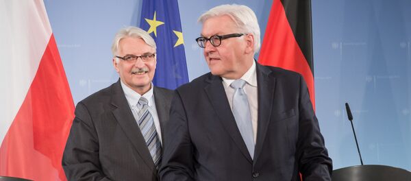 In this Nov. 26, 2015 photo German Foreign Minister Frank-Walter Steinmeier, right, and his Polish counterpart Witold Waszczykowski smile after a meeting in Berlin In this Nov. 26, 2015 photo German Foreign Minister Frank-Walter Steinmeier, right, and his Polish counterpart Witold Waszczykowski smile after a meeting in Berlin - Sputnik International